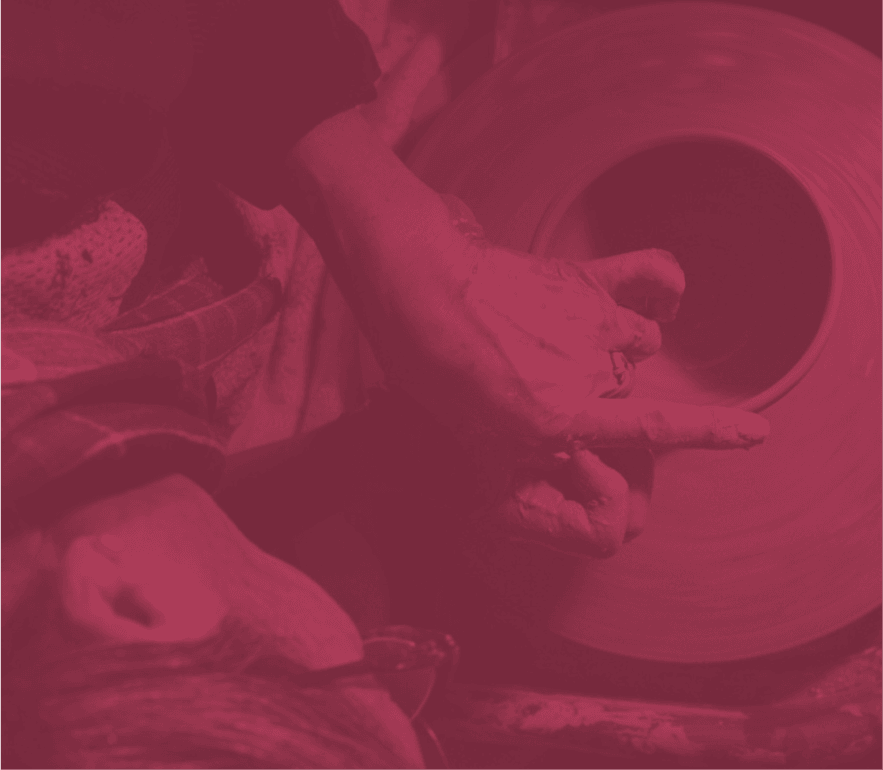 Potter working at the wheel during open studio access